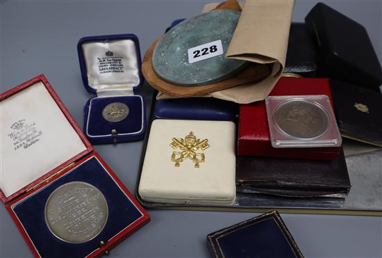 A collection of medals, coins etc